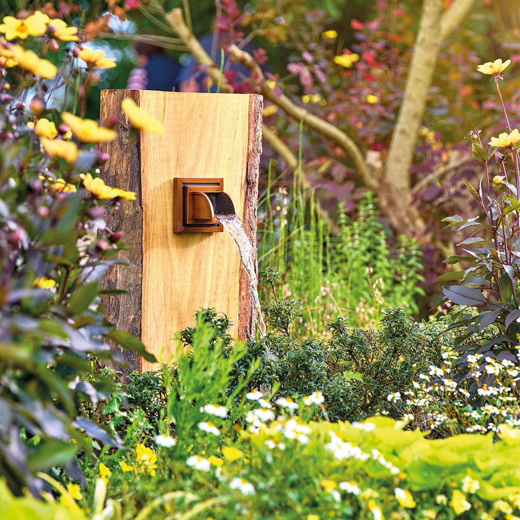 oase-uitloop-in-de-wand-koper